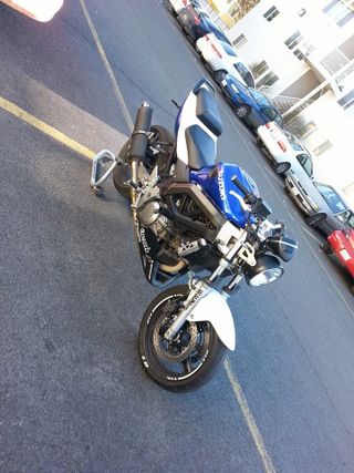 One of my new co-workers is a fellow SV enthusiast, and this is his customized SV650NK3.